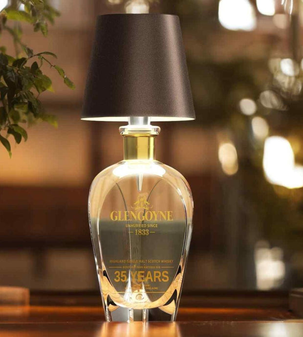 Lena flessenlamp draadloos op eettafel